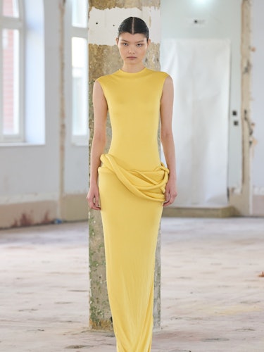 a yellow dress at standing ground